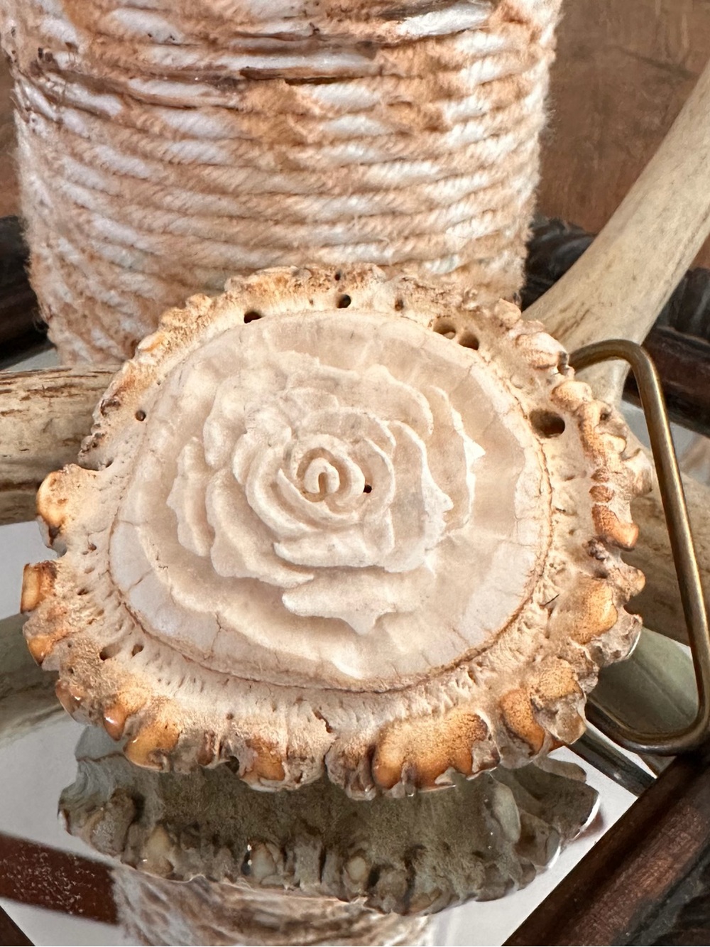 Vintage rose carved belt buckle made from a genuine elk antler burr by Ben Barto